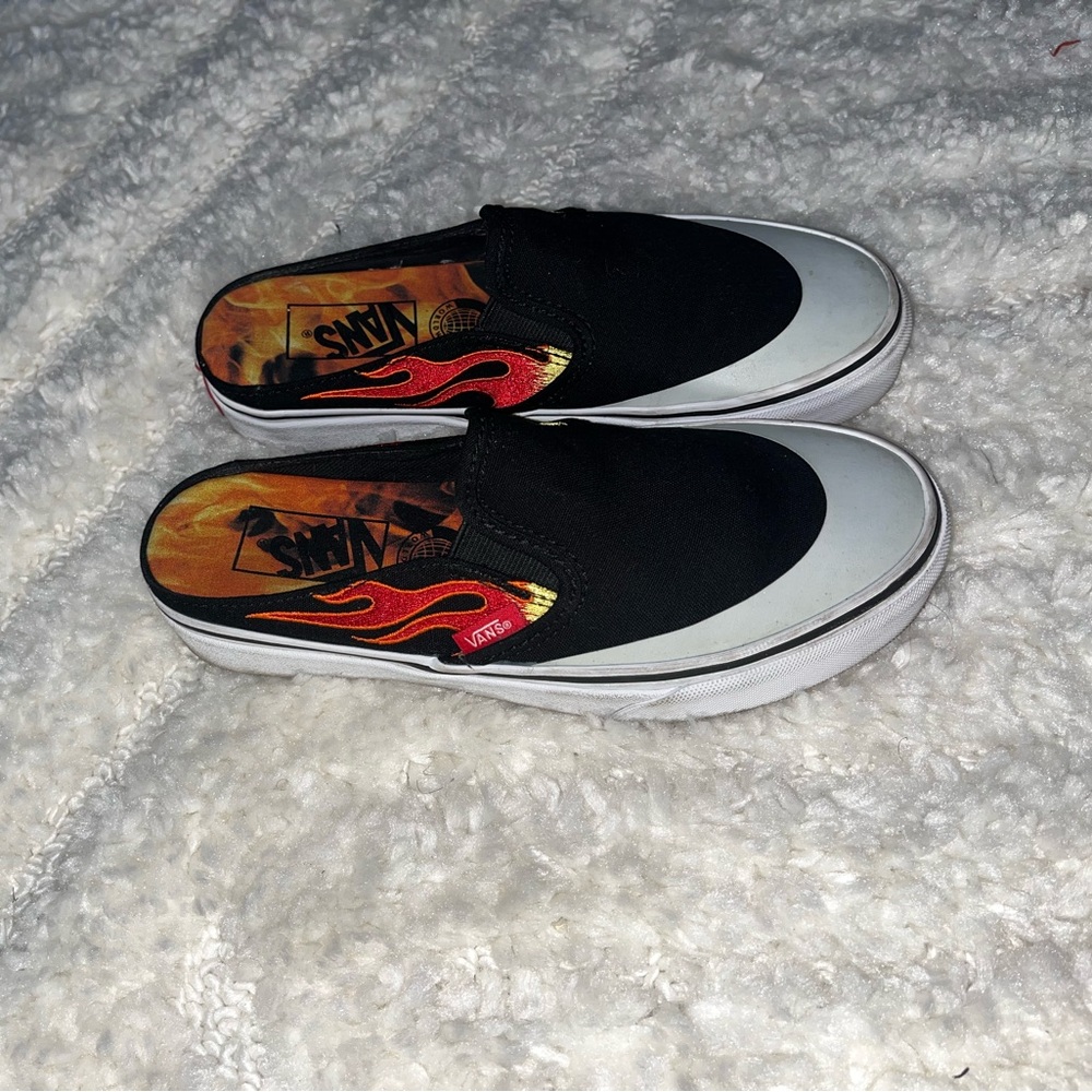 Vans Black and White Slip-Ons with Red Flame Design